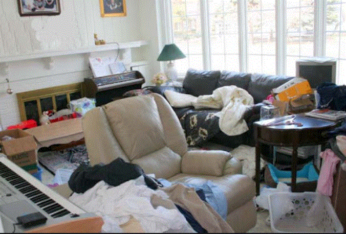 before view of the room with junk 